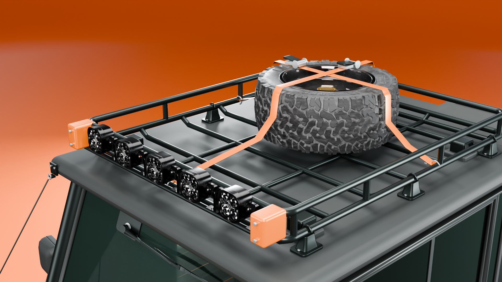 The roof carrier with a strapped-down spare wheel, orange ratchet straps and an LED light bar